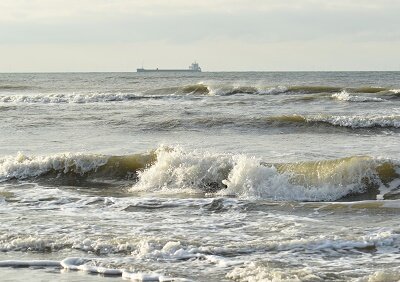 Roerige branding (Ansichtkaart)