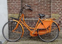 Oranje fiets (Ansichtkaart)