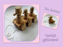 Dochter, houten speelgoed (Ansichtkaart)